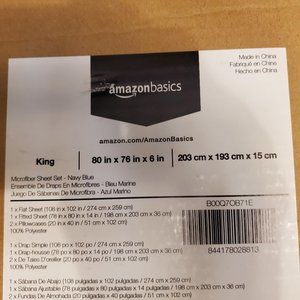 NEW STILL IN BOX KING SIZE SHEET SET IN ROYAL NAVY BLUE. SUPER SOFT MICROFIBER